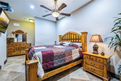 Nearly 6,000 Sq Ft of Purposeful Luxury with Dual Primary Suites on Laughlin Ranch Golf Club in Arizona - for sale on GolfHomes.com, golf home, golf lot