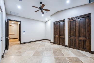 Nearly 6,000 Sq Ft of Purposeful Luxury with Dual Primary Suites on Laughlin Ranch Golf Club in Arizona - for sale on GolfHomes.com, golf home, golf lot