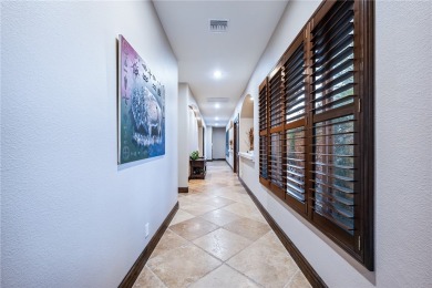 Nearly 6,000 Sq Ft of Purposeful Luxury with Dual Primary Suites on Laughlin Ranch Golf Club in Arizona - for sale on GolfHomes.com, golf home, golf lot