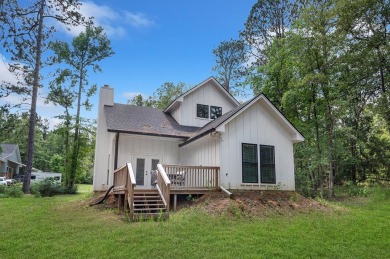 Modern Elegance meets Tranquil Luxury in this 2023-built on Rayburn Country Club in Texas - for sale on GolfHomes.com, golf home, golf lot