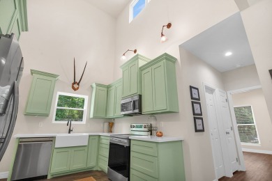 Modern Elegance meets Tranquil Luxury in this 2023-built on Rayburn Country Club in Texas - for sale on GolfHomes.com, golf home, golf lot