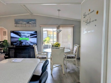 PICTURES SAY IT ALL! Uniquely designed 2 bedroom 2 bath on Grasslands Golf and Country Club in Florida - for sale on GolfHomes.com, golf home, golf lot