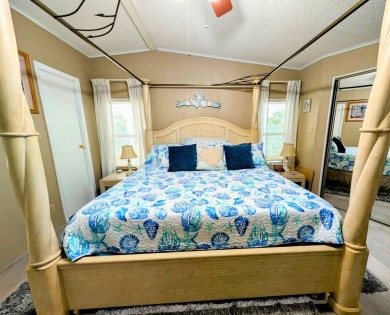 PICTURES SAY IT ALL! Uniquely designed 2 bedroom 2 bath on Grasslands Golf and Country Club in Florida - for sale on GolfHomes.com, golf home, golf lot