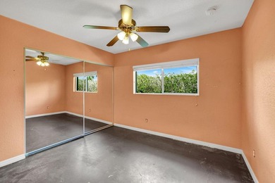 If you're looking for peaceful golf course living with oversized on Eagle Lakes Golf Club in Florida - for sale on GolfHomes.com, golf home, golf lot