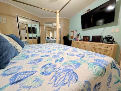 PICTURES SAY IT ALL! Uniquely designed 2 bedroom 2 bath on Grasslands Golf and Country Club in Florida - for sale on GolfHomes.com, golf home, golf lot
