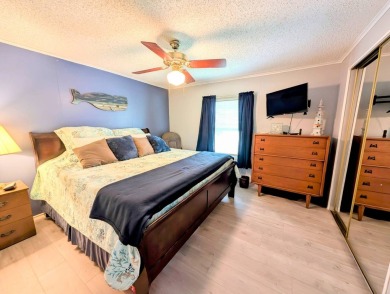 PICTURES SAY IT ALL! Uniquely designed 2 bedroom 2 bath on Grasslands Golf and Country Club in Florida - for sale on GolfHomes.com, golf home, golf lot
