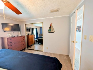 PICTURES SAY IT ALL! Uniquely designed 2 bedroom 2 bath on Grasslands Golf and Country Club in Florida - for sale on GolfHomes.com, golf home, golf lot