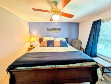 PICTURES SAY IT ALL! Uniquely designed 2 bedroom 2 bath on Grasslands Golf and Country Club in Florida - for sale on GolfHomes.com, golf home, golf lot
