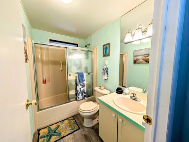 PICTURES SAY IT ALL! Uniquely designed 2 bedroom 2 bath on Grasslands Golf and Country Club in Florida - for sale on GolfHomes.com, golf home, golf lot