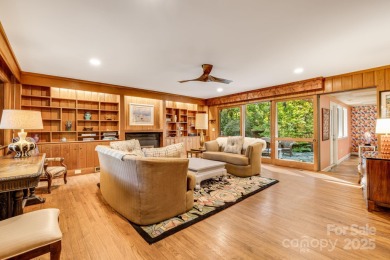 Access this beautifully remodeled Wright-inspired midcentury on Tryon Country Club in North Carolina - for sale on GolfHomes.com, golf home, golf lot