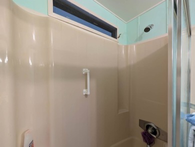 PICTURES SAY IT ALL! Uniquely designed 2 bedroom 2 bath on Grasslands Golf and Country Club in Florida - for sale on GolfHomes.com, golf home, golf lot