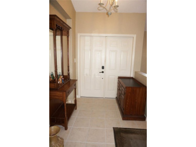 Impressive 3 Bedroom, 2 Bathroom WATERFRONT home with attached 2 on Saint Andrews South Golf Club in Florida - for sale on GolfHomes.com, golf home, golf lot