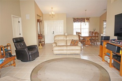 Impressive 3 Bedroom, 2 Bathroom WATERFRONT home with attached 2 on Saint Andrews South Golf Club in Florida - for sale on GolfHomes.com, golf home, golf lot
