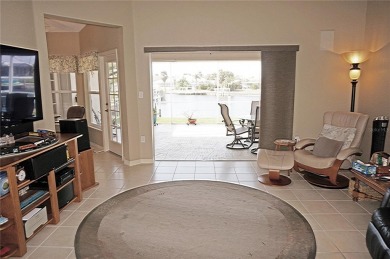 Impressive 3 Bedroom, 2 Bathroom WATERFRONT home with attached 2 on Saint Andrews South Golf Club in Florida - for sale on GolfHomes.com, golf home, golf lot