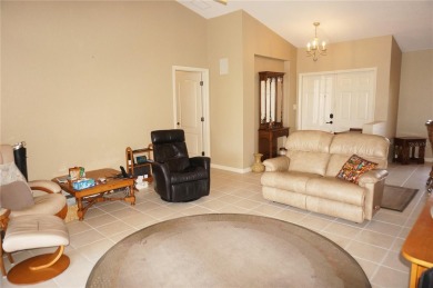 Impressive 3 Bedroom, 2 Bathroom WATERFRONT home with attached 2 on Saint Andrews South Golf Club in Florida - for sale on GolfHomes.com, golf home, golf lot