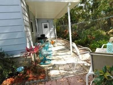 PICTURES SAY IT ALL! Uniquely designed 2 bedroom 2 bath on Grasslands Golf and Country Club in Florida - for sale on GolfHomes.com, golf home, golf lot