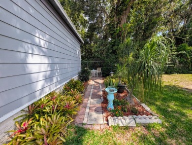 PICTURES SAY IT ALL! Uniquely designed 2 bedroom 2 bath on Grasslands Golf and Country Club in Florida - for sale on GolfHomes.com, golf home, golf lot