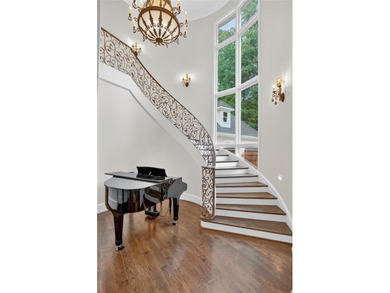 Stunning European-inspired estate nestled on a private, gated on Bobby Jones Golf Club in Georgia - for sale on GolfHomes.com, golf home, golf lot