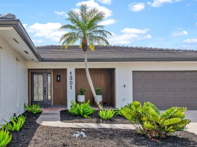 Step inside this beautifully updated coastal retreat and on Saint Andrews South Golf Club in Florida - for sale on GolfHomes.com, golf home, golf lot