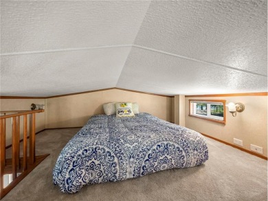 Experience seasonal living at its finest in the gated commnunity on Travelers Country Club in Minnesota - for sale on GolfHomes.com, golf home, golf lot