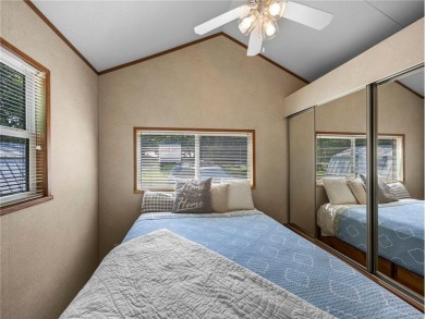 Experience seasonal living at its finest in the gated commnunity on Travelers Country Club in Minnesota - for sale on GolfHomes.com, golf home, golf lot