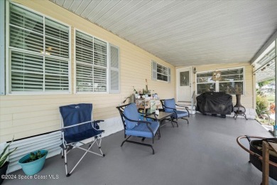 Welcome home! This 2 bed 2 bath home has over 1700 sf of living on Barefoot Bay Golf Course in Florida - for sale on GolfHomes.com, golf home, golf lot