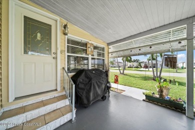 Welcome home! This 2 bed 2 bath home has over 1700 sf of living on Barefoot Bay Golf Course in Florida - for sale on GolfHomes.com, golf home, golf lot