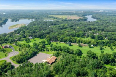 Experience seasonal living at its finest in the gated commnunity on Travelers Country Club in Minnesota - for sale on GolfHomes.com, golf home, golf lot