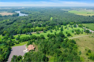 Experience seasonal living at its finest in the gated commnunity on Travelers Country Club in Minnesota - for sale on GolfHomes.com, golf home, golf lot