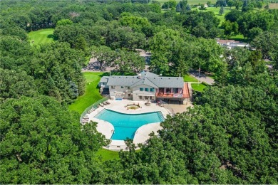 Experience seasonal living at its finest in the gated commnunity on Travelers Country Club in Minnesota - for sale on GolfHomes.com, golf home, golf lot