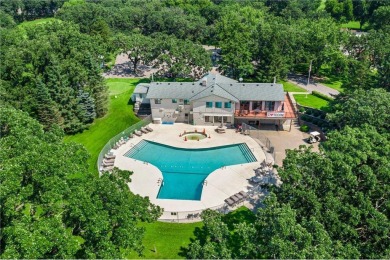 Experience seasonal living at its finest in the gated commnunity on Travelers Country Club in Minnesota - for sale on GolfHomes.com, golf home, golf lot