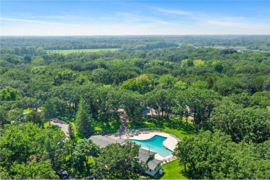 Experience seasonal living at its finest in the gated commnunity on Travelers Country Club in Minnesota - for sale on GolfHomes.com, golf home, golf lot
