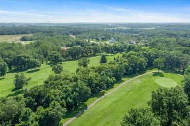 Experience seasonal living at its finest in the gated commnunity on Travelers Country Club in Minnesota - for sale on GolfHomes.com, golf home, golf lot
