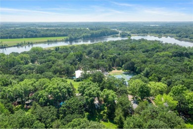 Experience seasonal living at its finest in the gated commnunity on Travelers Country Club in Minnesota - for sale on GolfHomes.com, golf home, golf lot