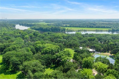 Experience seasonal living at its finest in the gated commnunity on Travelers Country Club in Minnesota - for sale on GolfHomes.com, golf home, golf lot