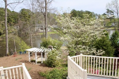 Welcome to your lakeside retreat at MacGregor Downs! Step into on MacGregor Downs Country Club in North Carolina - for sale on GolfHomes.com, golf home, golf lot