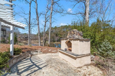 Welcome to your lakeside retreat at MacGregor Downs! Step into on MacGregor Downs Country Club in North Carolina - for sale on GolfHomes.com, golf home, golf lot