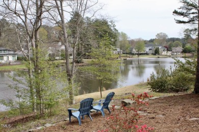 Welcome to your lakeside retreat at MacGregor Downs! Step into on MacGregor Downs Country Club in North Carolina - for sale on GolfHomes.com, golf home, golf lot