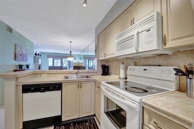 *** BEAUTIFUL VIEW ON THE LAKE FROM THE 1ST FLOOR UNIT FROM THE on Palm-Aire Country Club and Resort - Palms in Florida - for sale on GolfHomes.com, golf home, golf lot