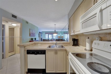 *** BEAUTIFUL VIEW ON THE LAKE FROM THE 1ST FLOOR UNIT FROM THE on Palm-Aire Country Club and Resort - Palms in Florida - for sale on GolfHomes.com, golf home, golf lot