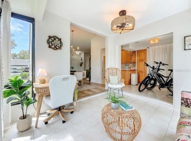 -THIS HOME IS A ABSOLUTE MUST SEE- Experience serene pond views on Lansbrook Golf Club in Florida - for sale on GolfHomes.com, golf home, golf lot
