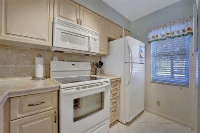 *** BEAUTIFUL VIEW ON THE LAKE FROM THE 1ST FLOOR UNIT FROM THE on Palm-Aire Country Club and Resort - Palms in Florida - for sale on GolfHomes.com, golf home, golf lot