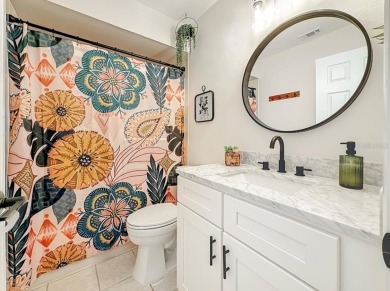 -THIS HOME IS A ABSOLUTE MUST SEE- Experience serene pond views on Lansbrook Golf Club in Florida - for sale on GolfHomes.com, golf home, golf lot