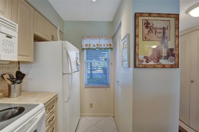 *** BEAUTIFUL VIEW ON THE LAKE FROM THE 1ST FLOOR UNIT FROM THE on Palm-Aire Country Club and Resort - Palms in Florida - for sale on GolfHomes.com, golf home, golf lot