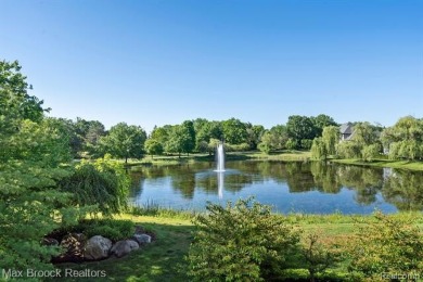 This exquisite French Country-inspired residence is situated on Forest Lake Country Club in Michigan - for sale on GolfHomes.com, golf home, golf lot