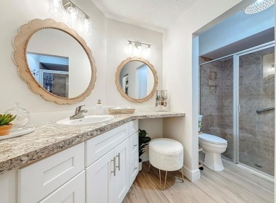 -THIS HOME IS A ABSOLUTE MUST SEE- Experience serene pond views on Lansbrook Golf Club in Florida - for sale on GolfHomes.com, golf home, golf lot