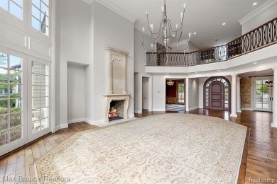 This exquisite French Country-inspired residence is situated on Forest Lake Country Club in Michigan - for sale on GolfHomes.com, golf home, golf lot