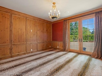 This exquisite French Country-inspired residence is situated on Forest Lake Country Club in Michigan - for sale on GolfHomes.com, golf home, golf lot