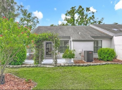 -THIS HOME IS A ABSOLUTE MUST SEE- Experience serene pond views on Lansbrook Golf Club in Florida - for sale on GolfHomes.com, golf home, golf lot