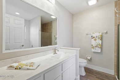 Beautifully updated home in a quiet New Smyrna Beach on Hidden Lakes Golf Club in Florida - for sale on GolfHomes.com, golf home, golf lot